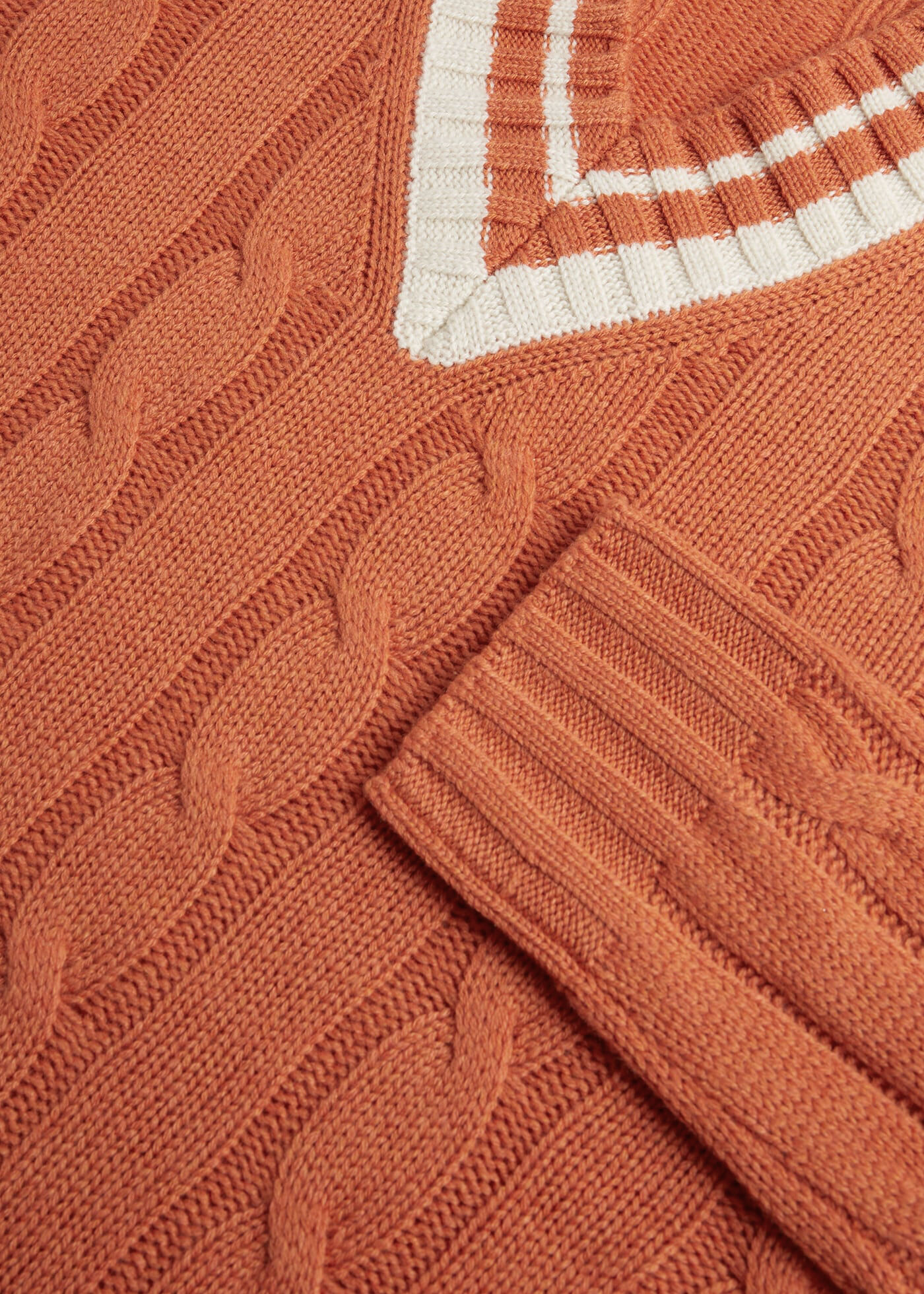 cable knit tennis sweater