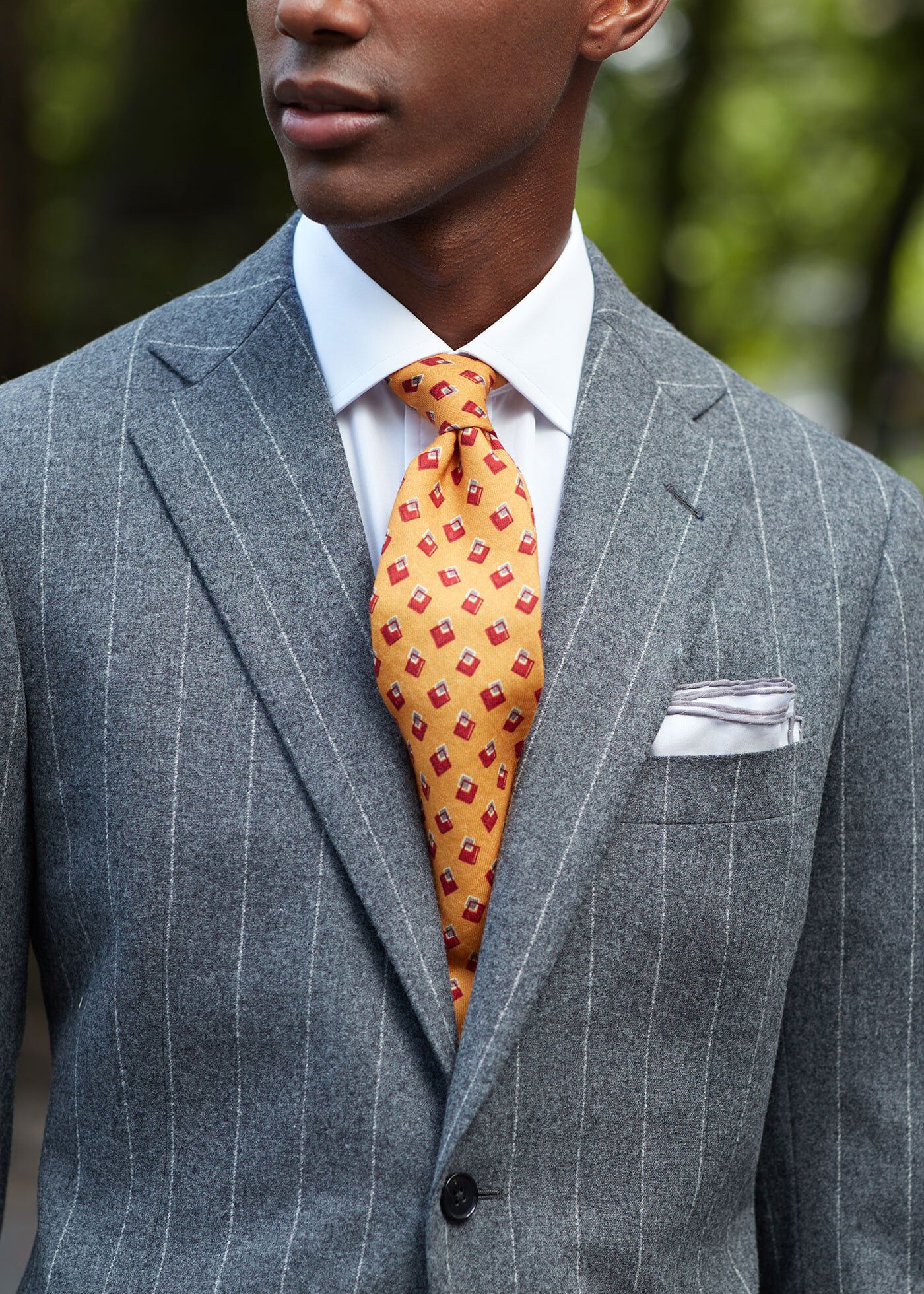Grey suit orange store shirt